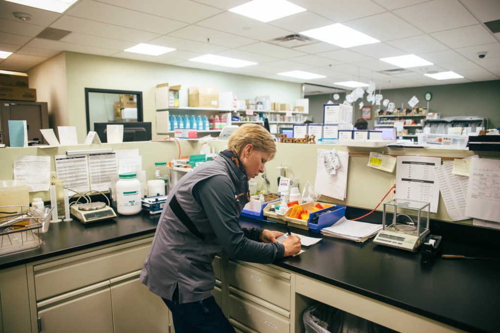 8:29 a.m. | Veterinary pharmacist Charleen Becker starts the day making capsules that are not commercially available. By the end of the day, the pharmacy team will fill around 400 prescriptions.