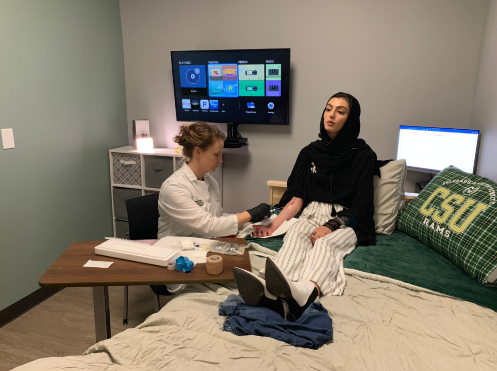 Slam poet Merall Sherif and professor Josiane Broussard filming in a sleep lab for the Women in Science video.