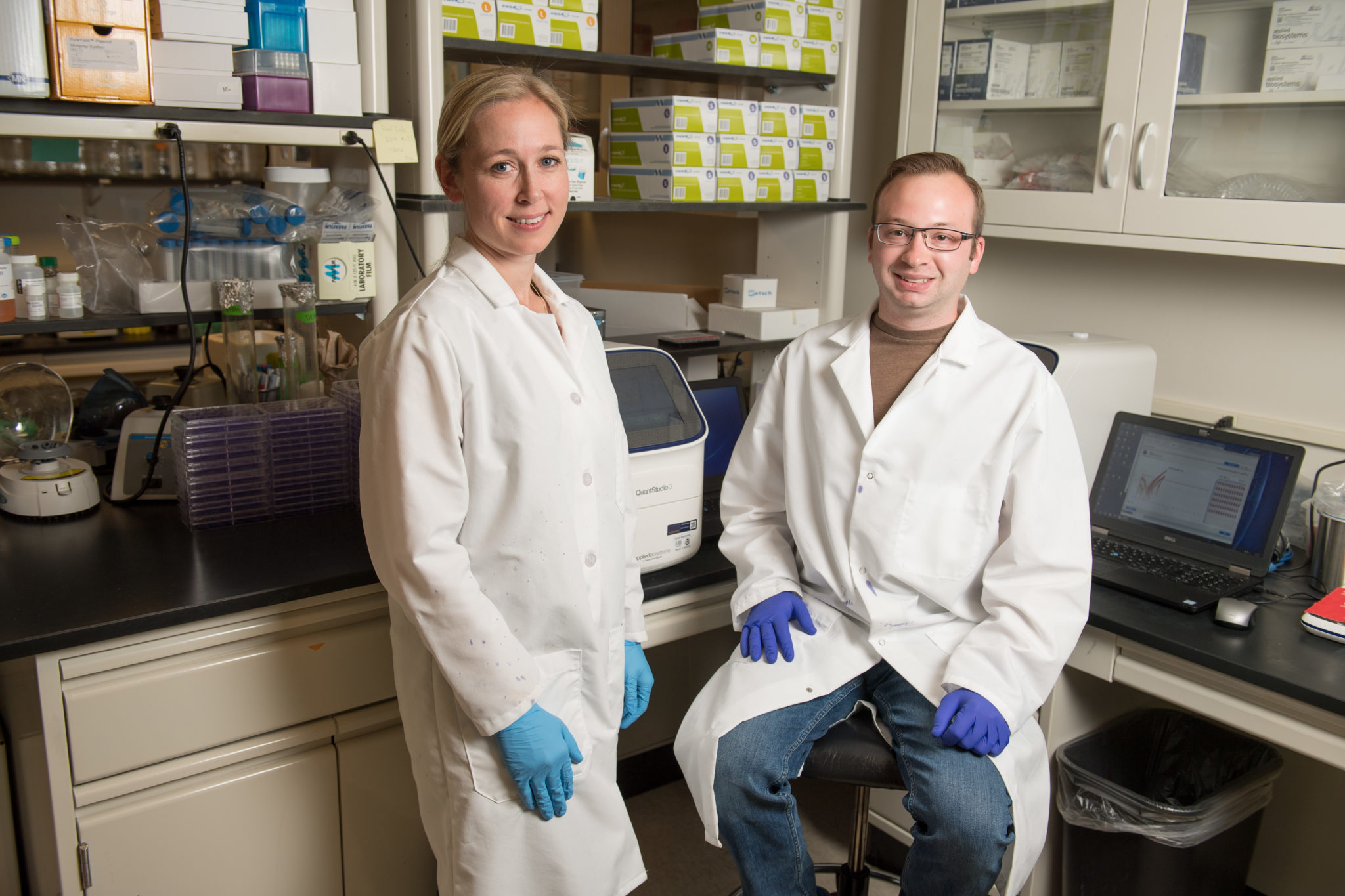 researchers Rebekah Kading and Nick Bergren in Kading's Lab at Colorado State University