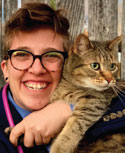 Morgan Miller with a cat