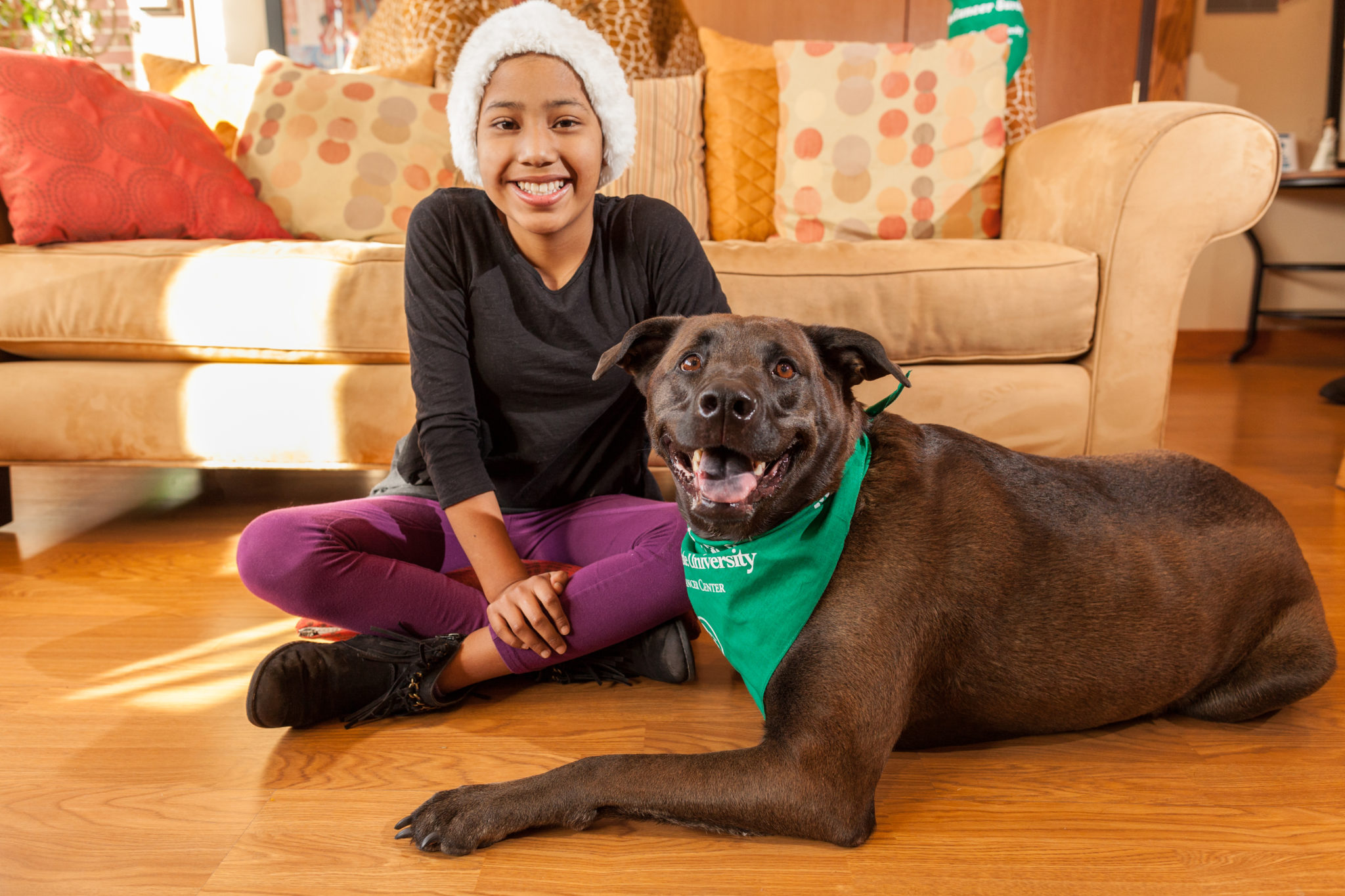 Human and canine bone cancer survivors Solei and Alba